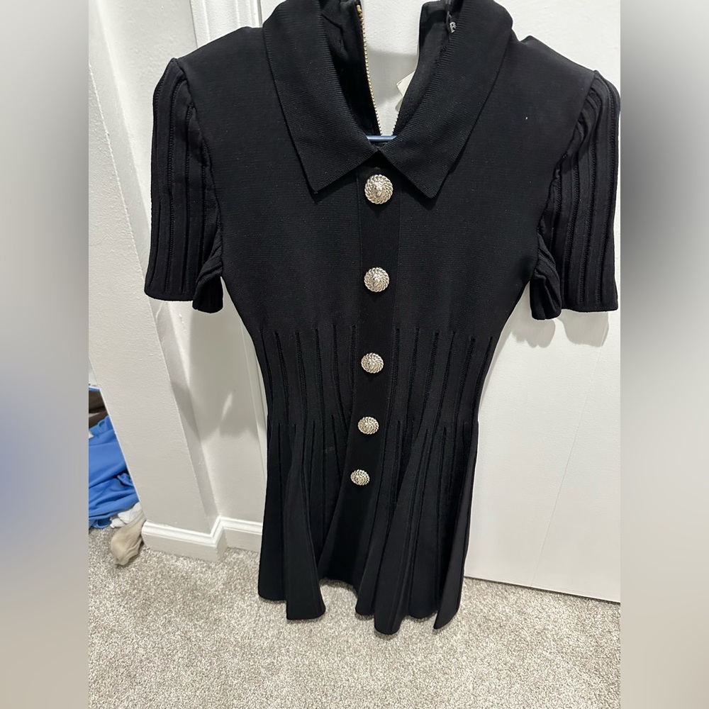 Balmain Black Garment with Gold Accents